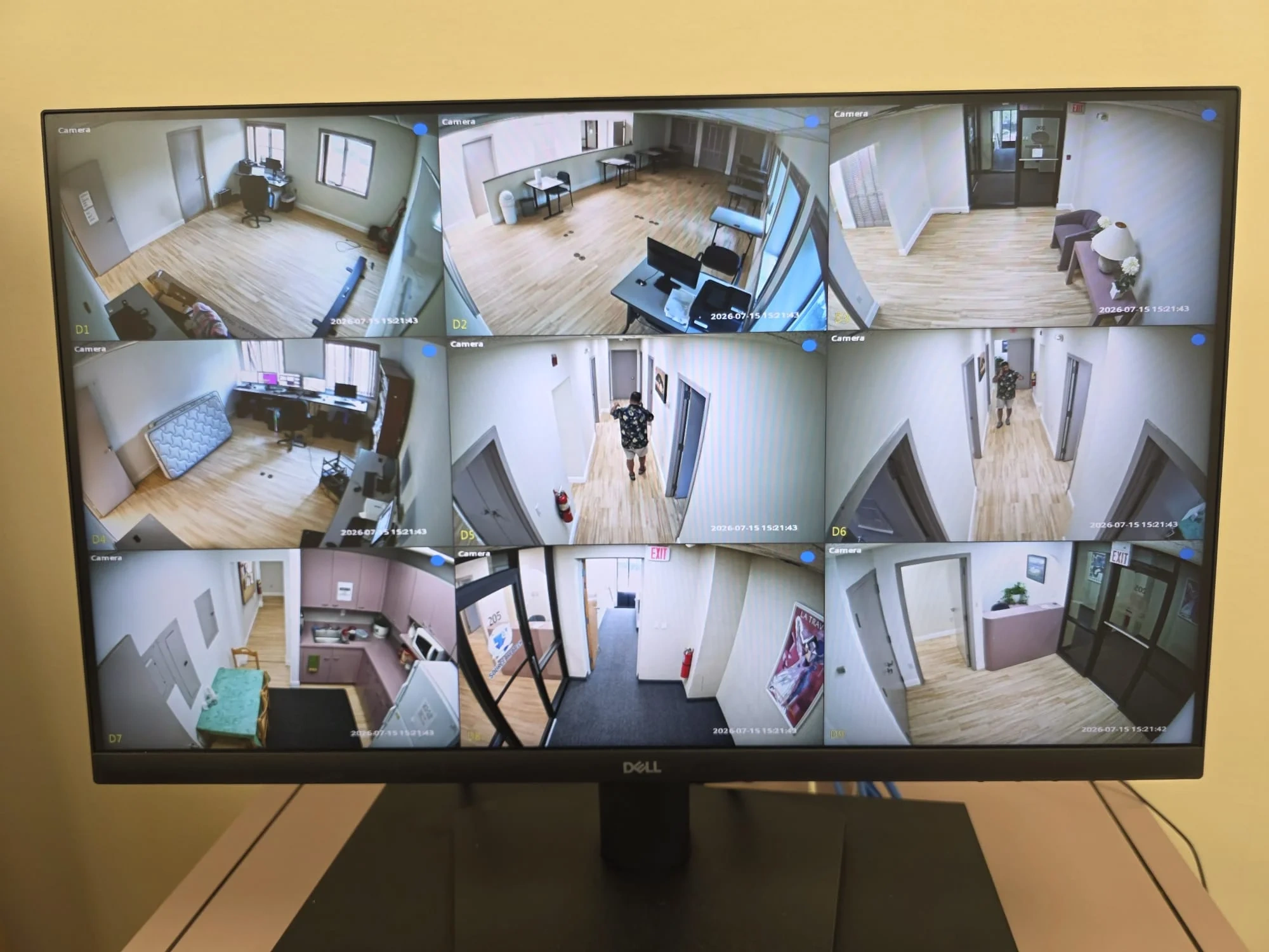 CCTV security camera monitoring wall with multiple live feeds