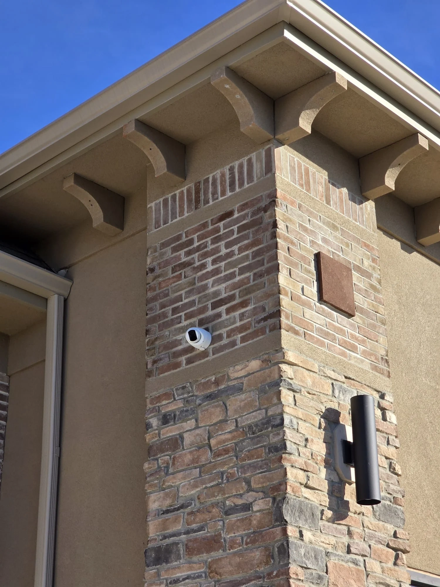 Exterior security camera installed on a commercial building